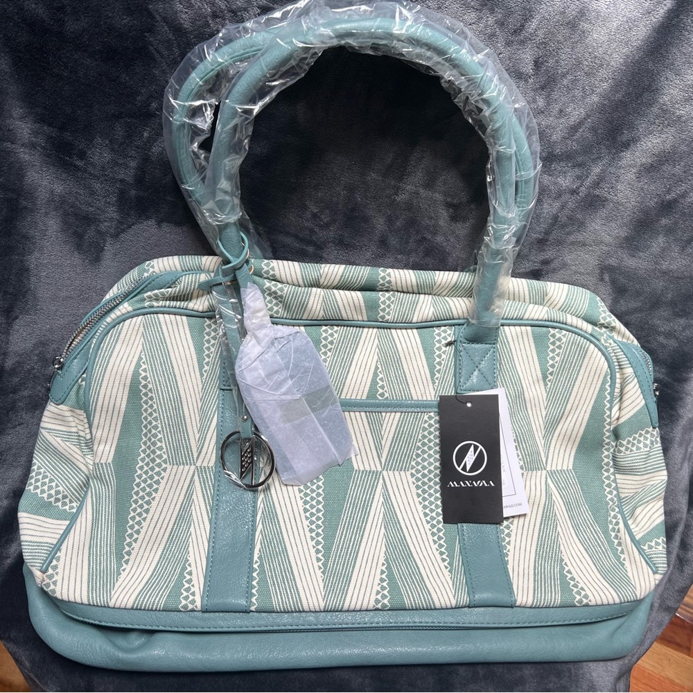 MANAOLA leather and canvas travel bag; seafoam and cream